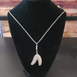 Silver Feather Pendant Necklace